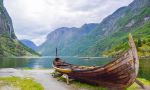 Wooden boat in front of river 